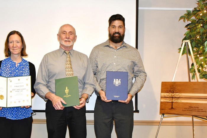 MPs and MPPs honoured William Dunlop with scrolls.