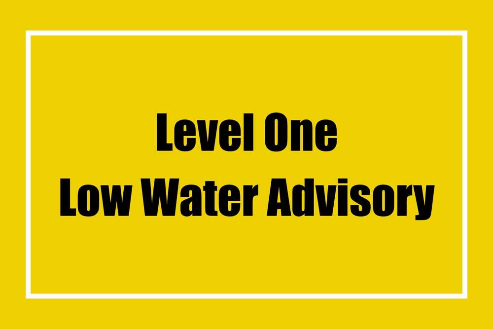 A yellow graphic saying Level 1 Low Water Advisory.