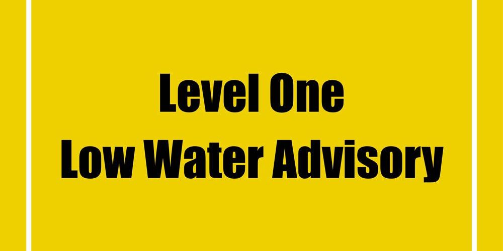 A yellow graphic indicating a Level One Low Water Advisory.