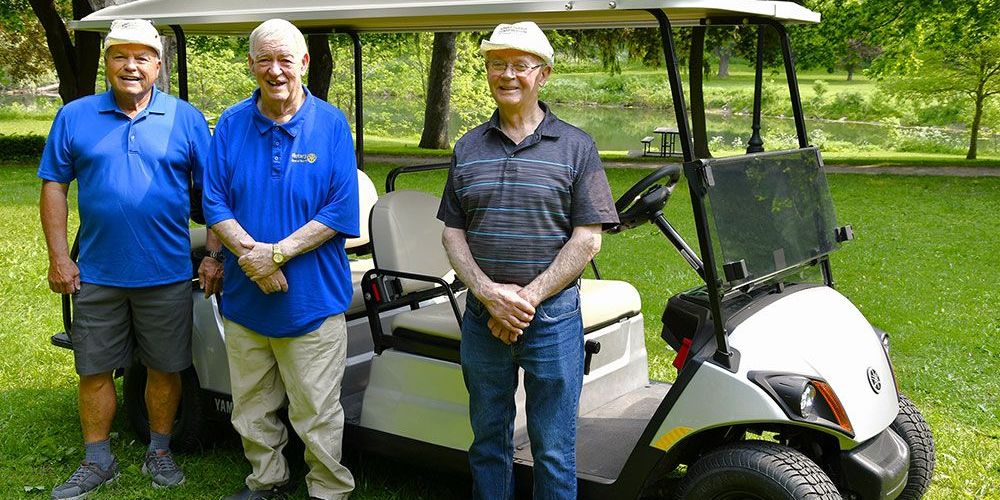 Jim Hayter, Bob Down, and Norm Eckel with the new Trail Mobile.