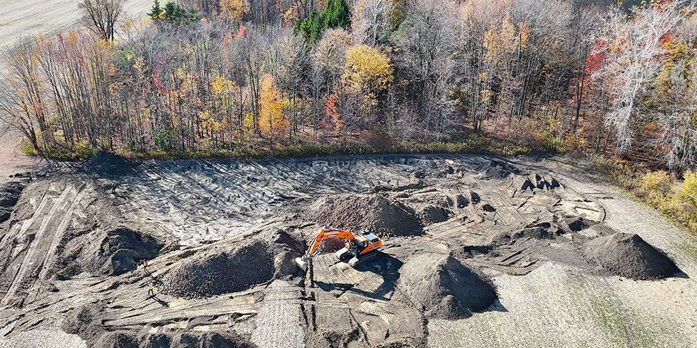 A photo of construction of a wetland.